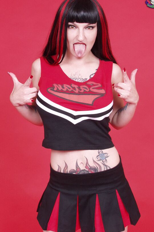 15P Satan cheerleader fucks self with cross