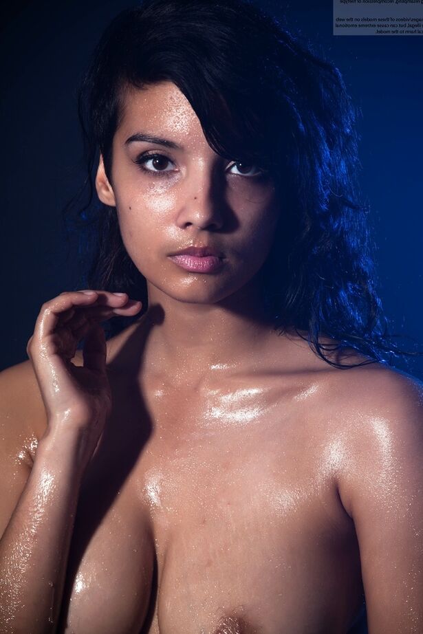 16P Indian chick shows off her big natural tits while modeling in the nude