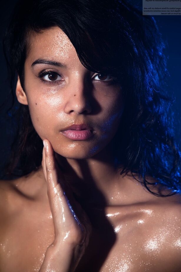 16P Indian chick shows off her big natural tits while modeling in the nude