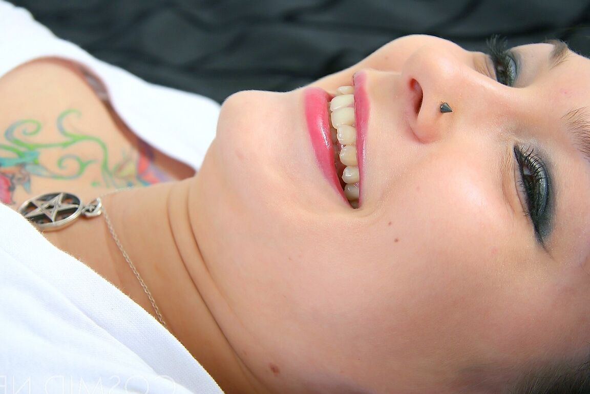 16P Gorgeous tattooed Jennique slides her huge breasts out of her tight sweater