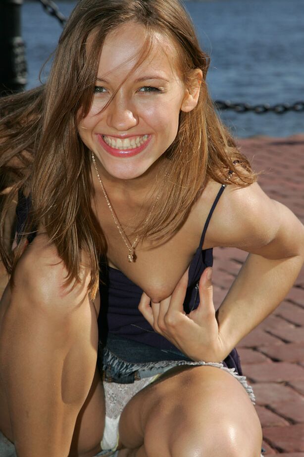 12P Pertty redhead flashes her perky tits at the park & spreads for panty upskirt