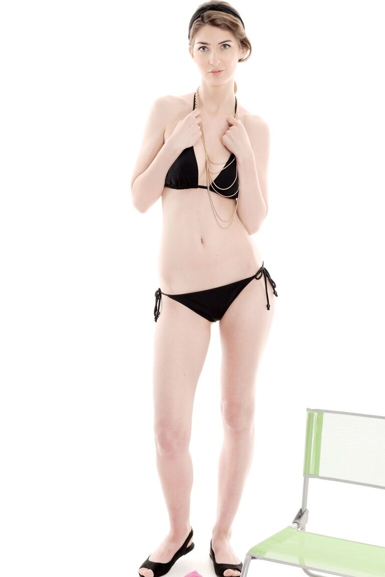 15P Thin solo girl Charlotta takes off her black bikini to pose in the nude