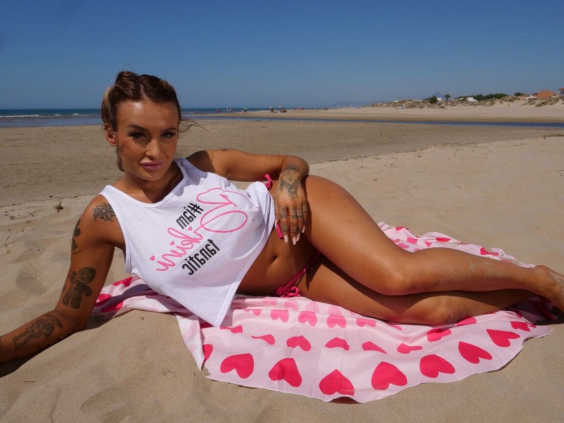 12P Daisy loves to get wild while modelling her micro bikinis and today she gets