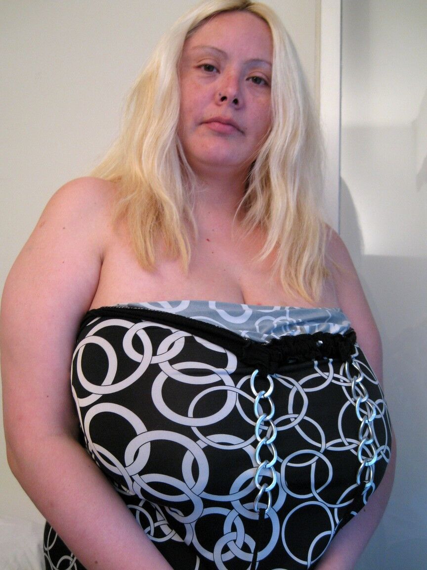 20P Chubby blonde Dalila lets out her magnificent breasts and flaunts them