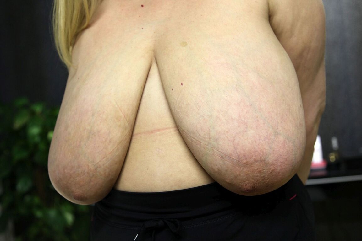 20P Chubby blonde Dalila lets out her magnificent breasts and flaunts them