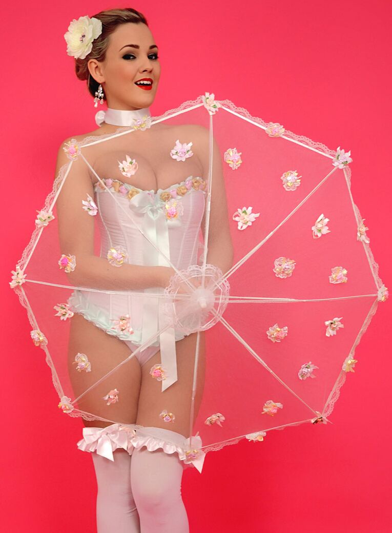 17P Pinup model lets her hair down before freeing her nice tits from a corset