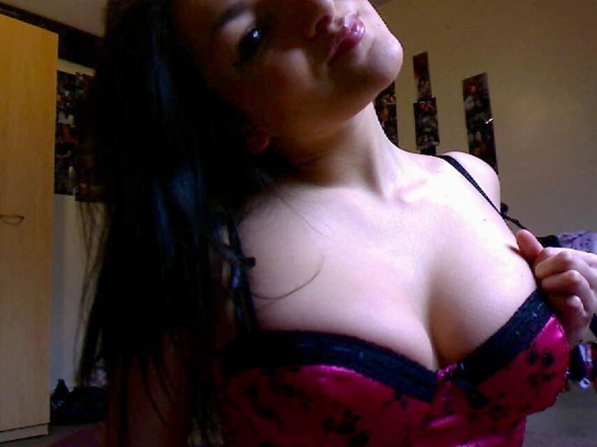 12P Ginas huge tits are almost popping out of her pink corset