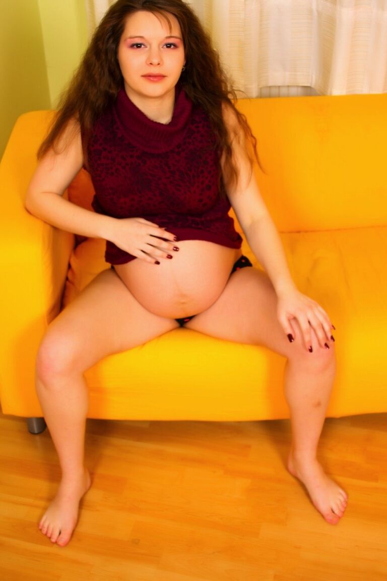 12P Pregnant brunette puts her belly bump on display while riding on top of a cock