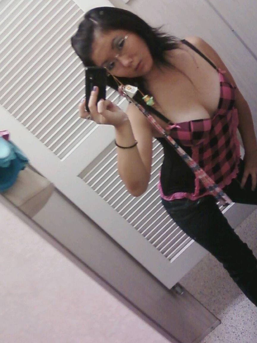 20P Sweet Asian girl with stunning big tits Chiyoko poses in front of a mirror