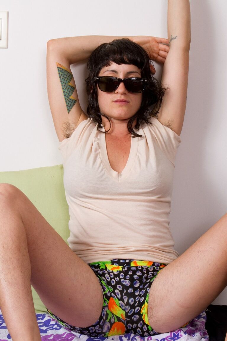 18P Brunette babe with glasses Stacey Stax shows big tits and her bush in a solo
