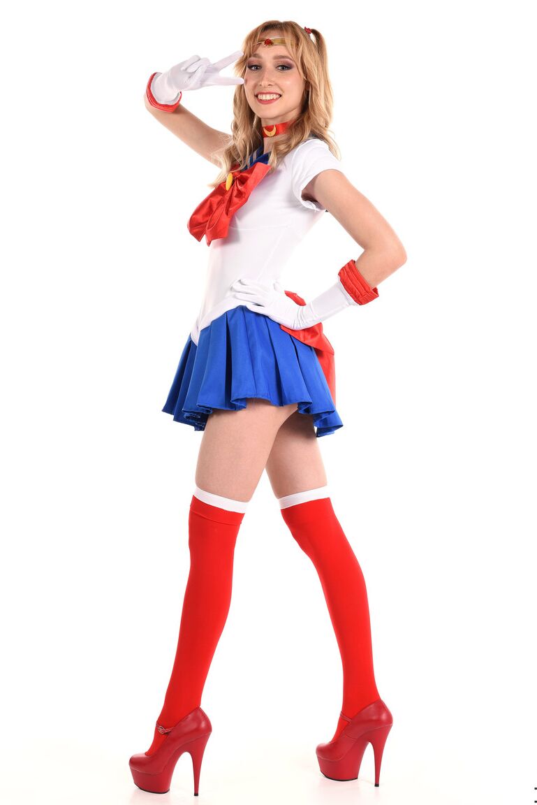 15P Solo girl Kelly Collins prances about in cosplay attire before toying her cunt