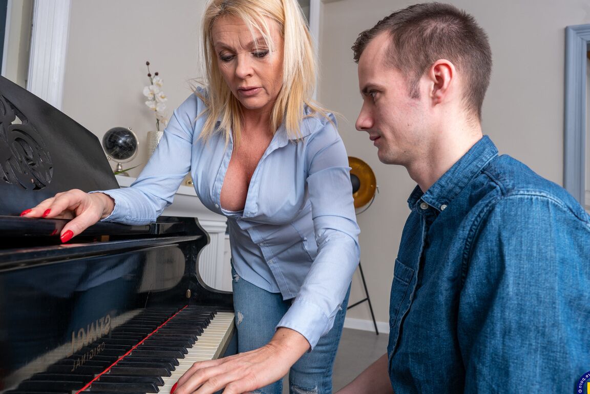 16P Blonde cougar seduces a younger man while they are at the piano