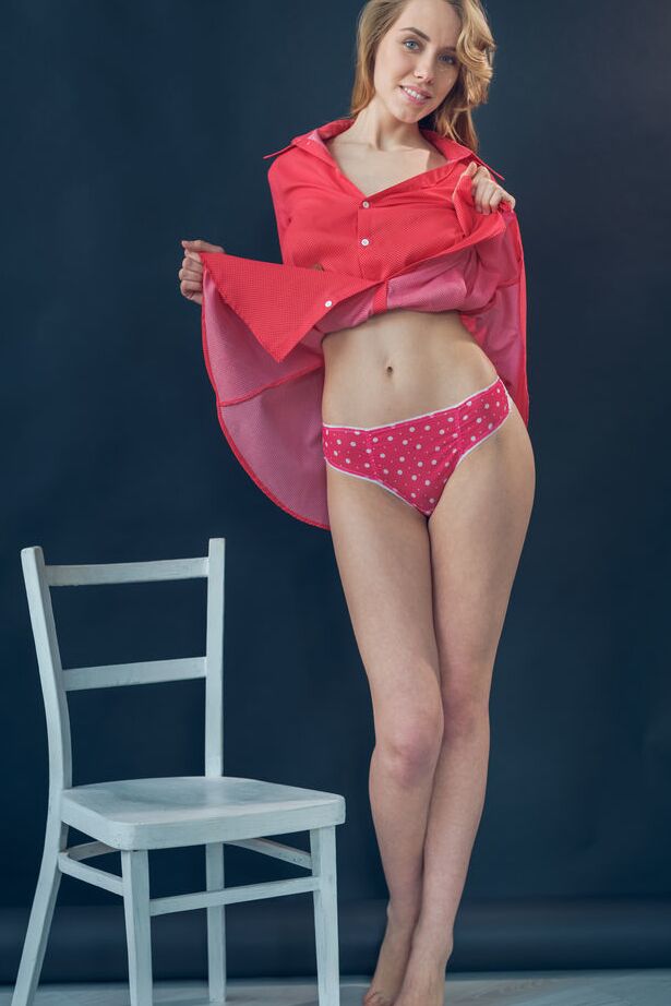 18P Long legged teen Ryana flashes her undies before setting out to model naked