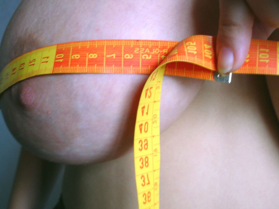 21P Black haired amatuer Joana lets out her massive melons and measures them