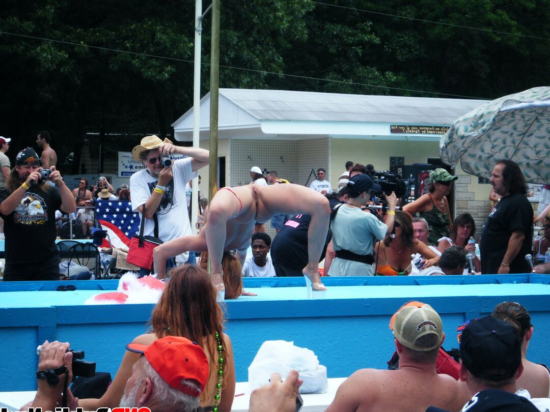 12P Lots of big tit girls stripping on an outdoor stage for all to watch