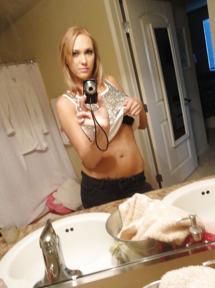 16P Alexia Rae shows off naked on cam while touching herself