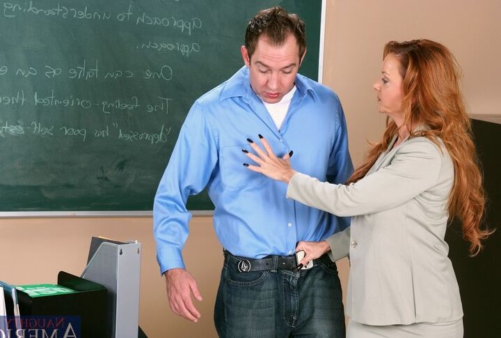 21P Redheaded teacher Janet Mason seduces a guy and gets fucked at school