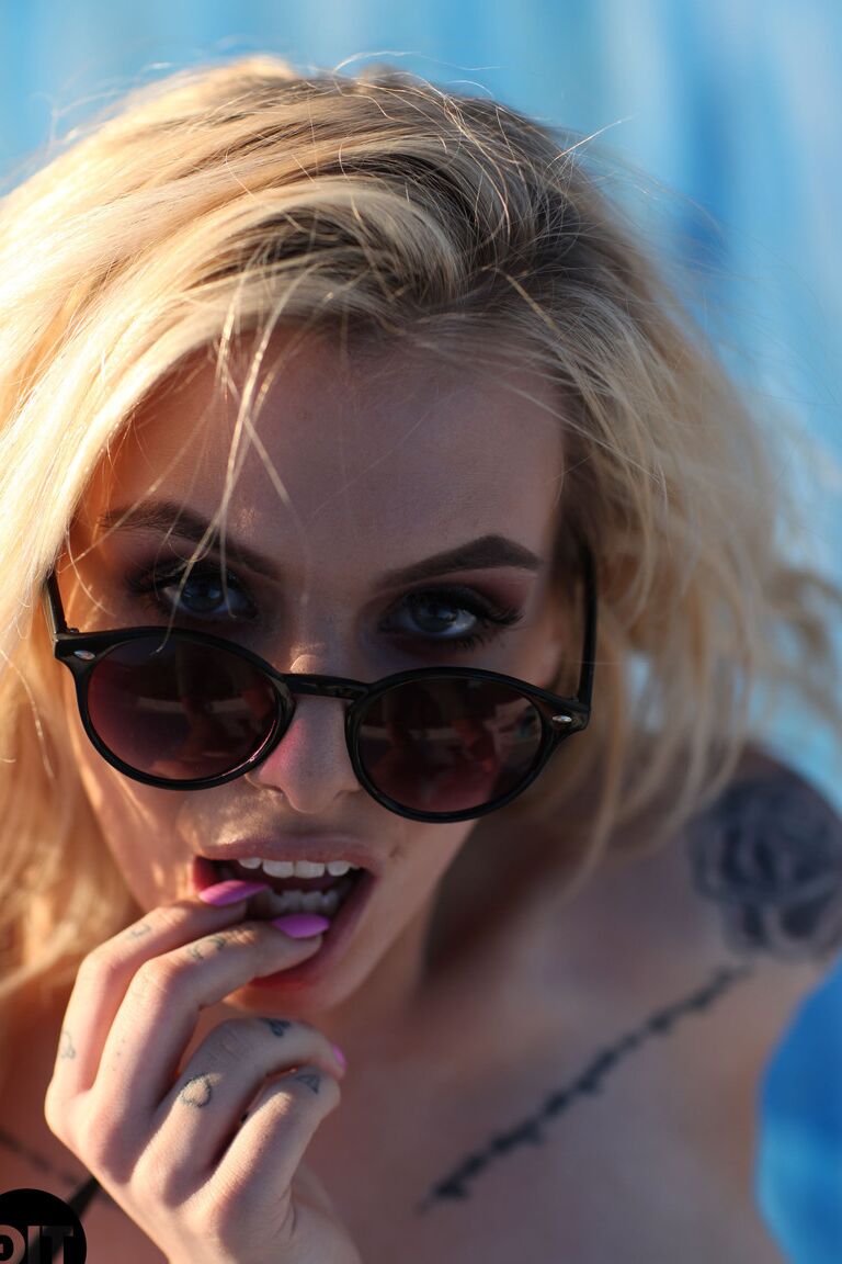 21P Wonderful blonde Saskia Valentine drops her sheer robe and poses topless