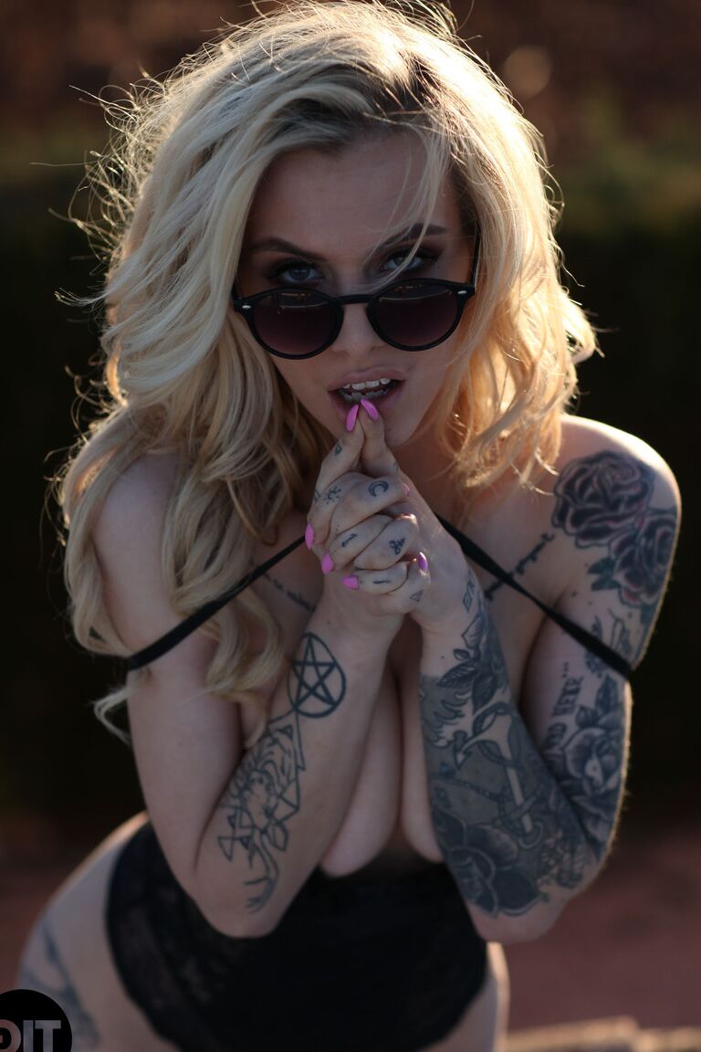 21P Wonderful blonde Saskia Valentine drops her sheer robe and poses topless