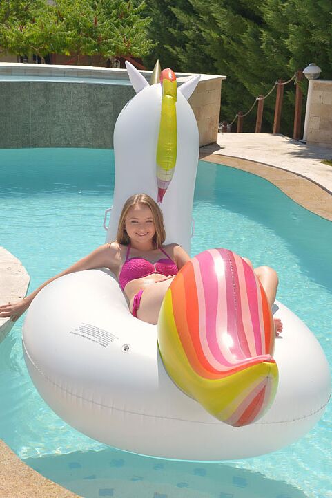 12P Blonde girl Lady Bug lounges in the pool before fucking on the patio