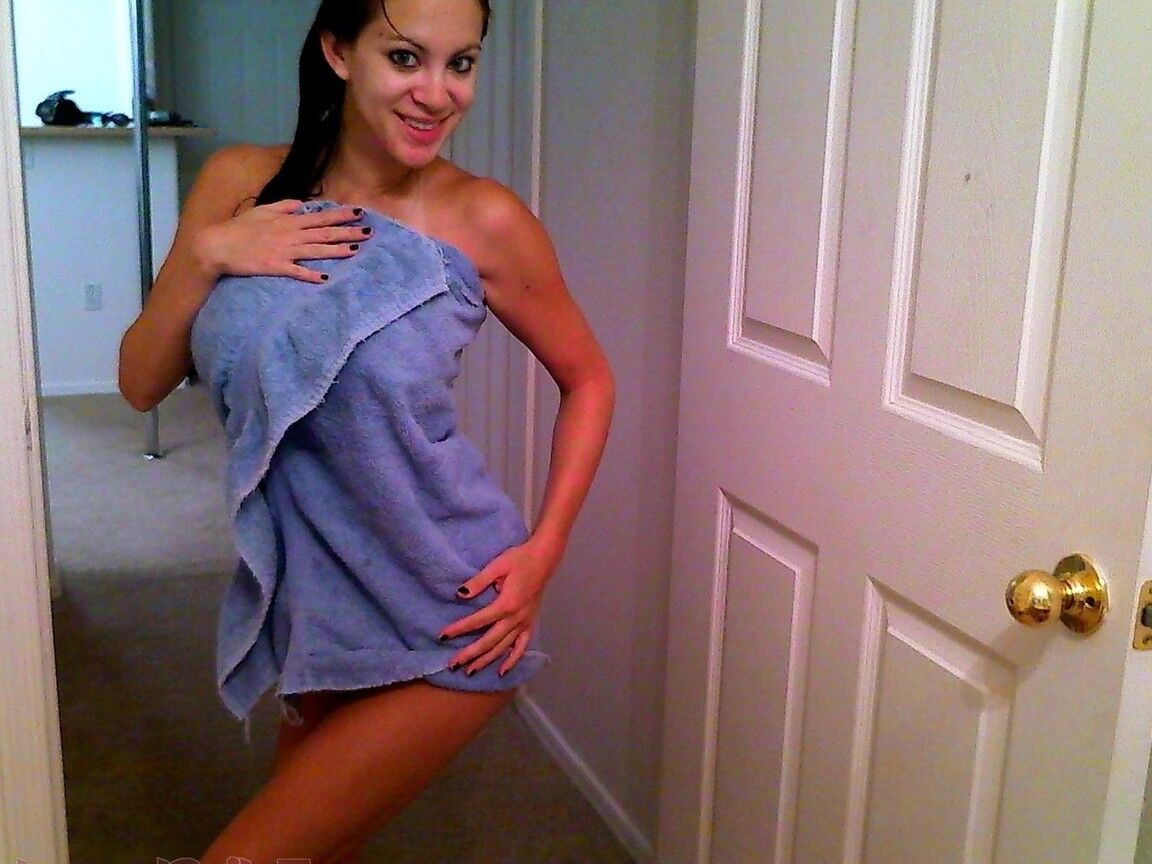 15P Brunette girl Talia Shepard soaks up her fake tits while taking a shower