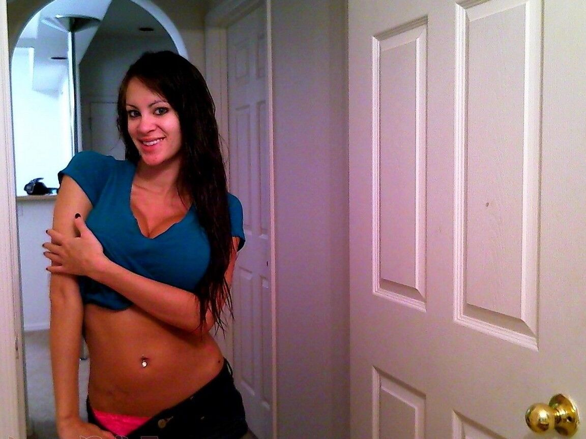 15P Brunette girl Talia Shepard soaks up her fake tits while taking a shower