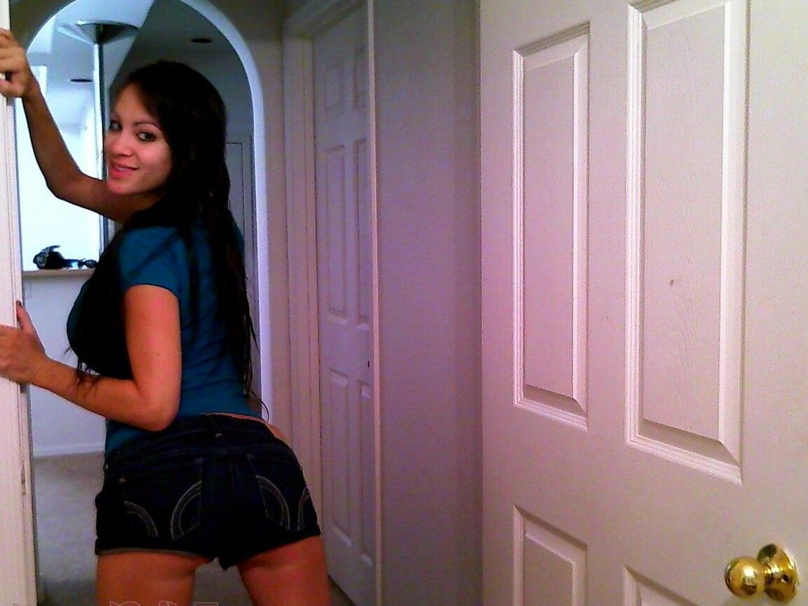 15P Brunette girl Talia Shepard soaks up her fake tits while taking a shower