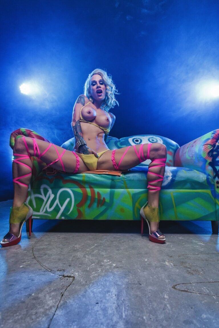 12P Inked blonde Sarah Jessie slides bikini bottoms aside after baring her boobs