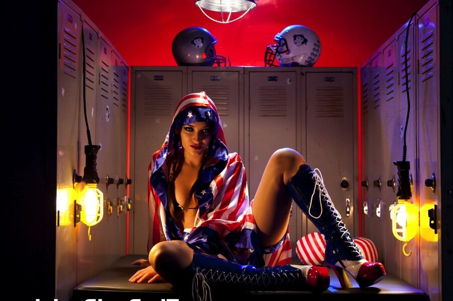 16P Solo model Dani Daniels strips off USA themed clothes to model in the nude