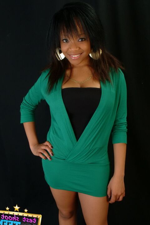 16P Adorable ebony girl Tiny wears a great smile while modelling non nude