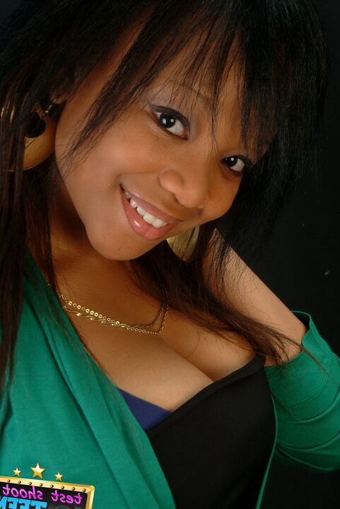 16P Adorable ebony girl Tiny wears a great smile while modelling non nude