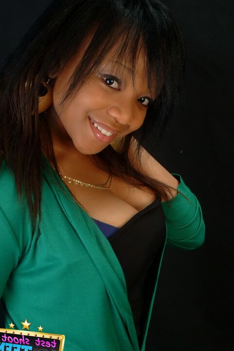 16P Adorable ebony girl Tiny wears a great smile while modelling non nude