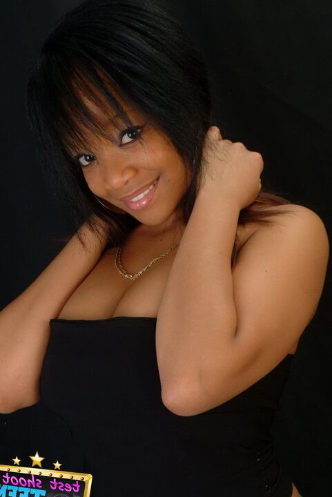 16P Adorable ebony girl Tiny wears a great smile while modelling non nude