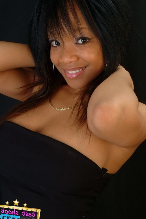 16P Adorable ebony girl Tiny wears a great smile while modelling non nude