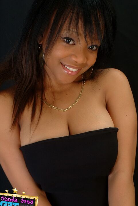 16P Adorable ebony girl Tiny wears a great smile while modelling non nude