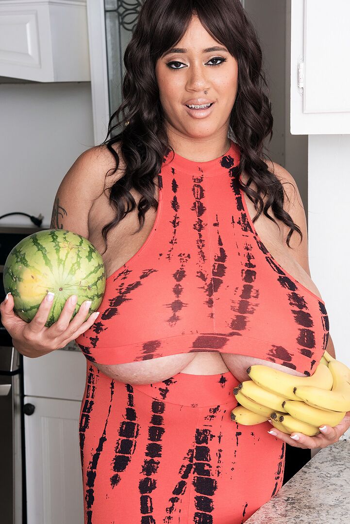 17P MILF Roxi Red shows off her giant melons that are much bigger than watermelons