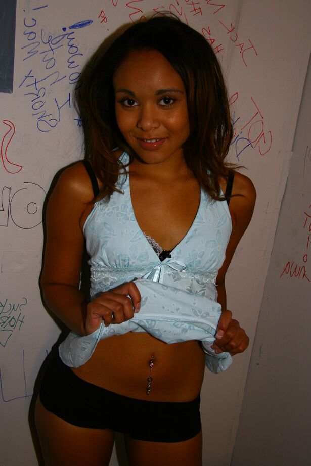 21P Ebony babe with tiny tits Octavia strips and blows a gloryhole cock