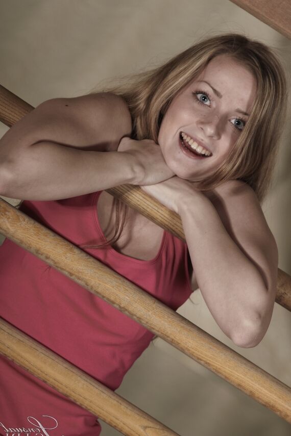 10P Blonde chick Abigaile Johnson does a striptease afore a wooden ladder