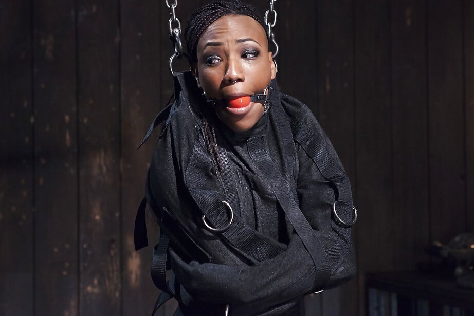 16P Ebony chick Nikki Darling gets anally abused in straight-jacket