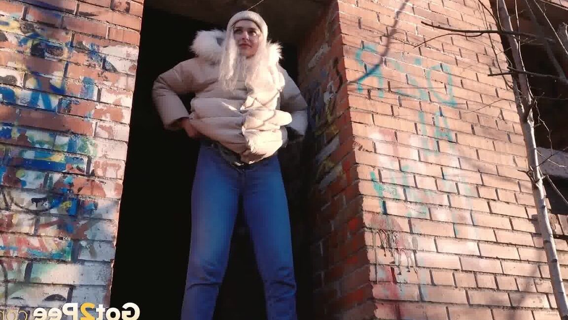 15P Blonde girl Masha Sweet takes a piss in an abandoned building on a cold day