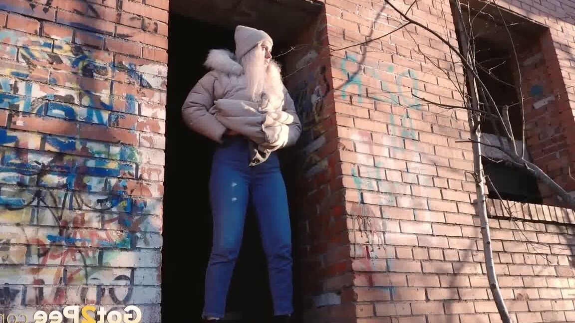 15P Blonde girl Masha Sweet takes a piss in an abandoned building on a cold day