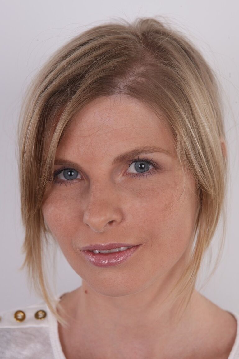20P Amateur model Anastasia stands straight while slowly getting completely naked