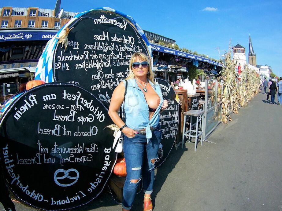 19P Thick blonde serves beer with big boobs out after putting in wood in the nude