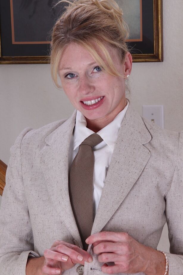 15P Classy MILF Holly Jones unbuttons after work to model totally nude