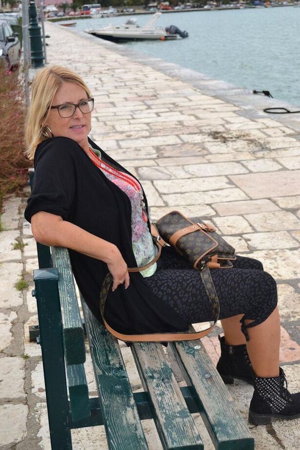 19P Hugely busty mature slut Chrissy swims and lounges at the beach stark naked