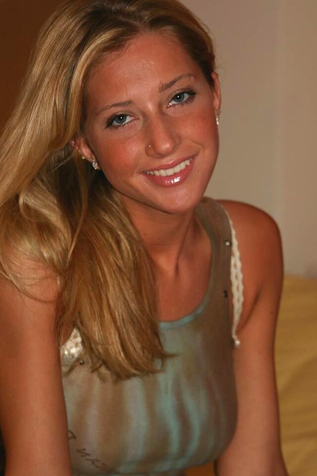16P Cute blonde Sammie uncups her firm tits while getting undressed