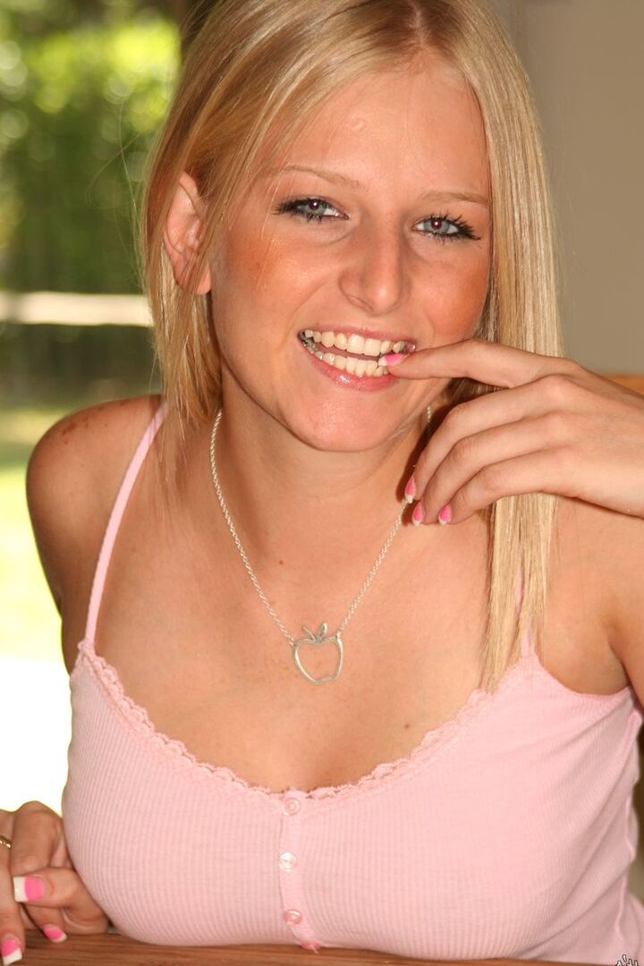 16P Natural blonde Ziggy finger spreads her vagina on top of a dining table