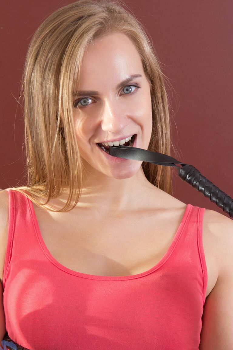 21P Viola Vee strips & fingers herself as she poses with leather whip in her hands