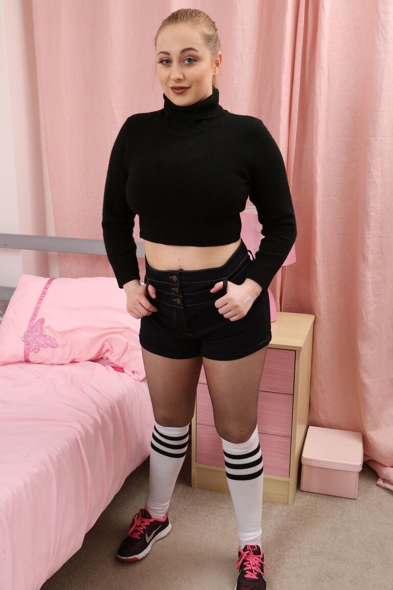 21P Babe with ponytail Emma Rachael strips to pantyhose and flaunts giant tits