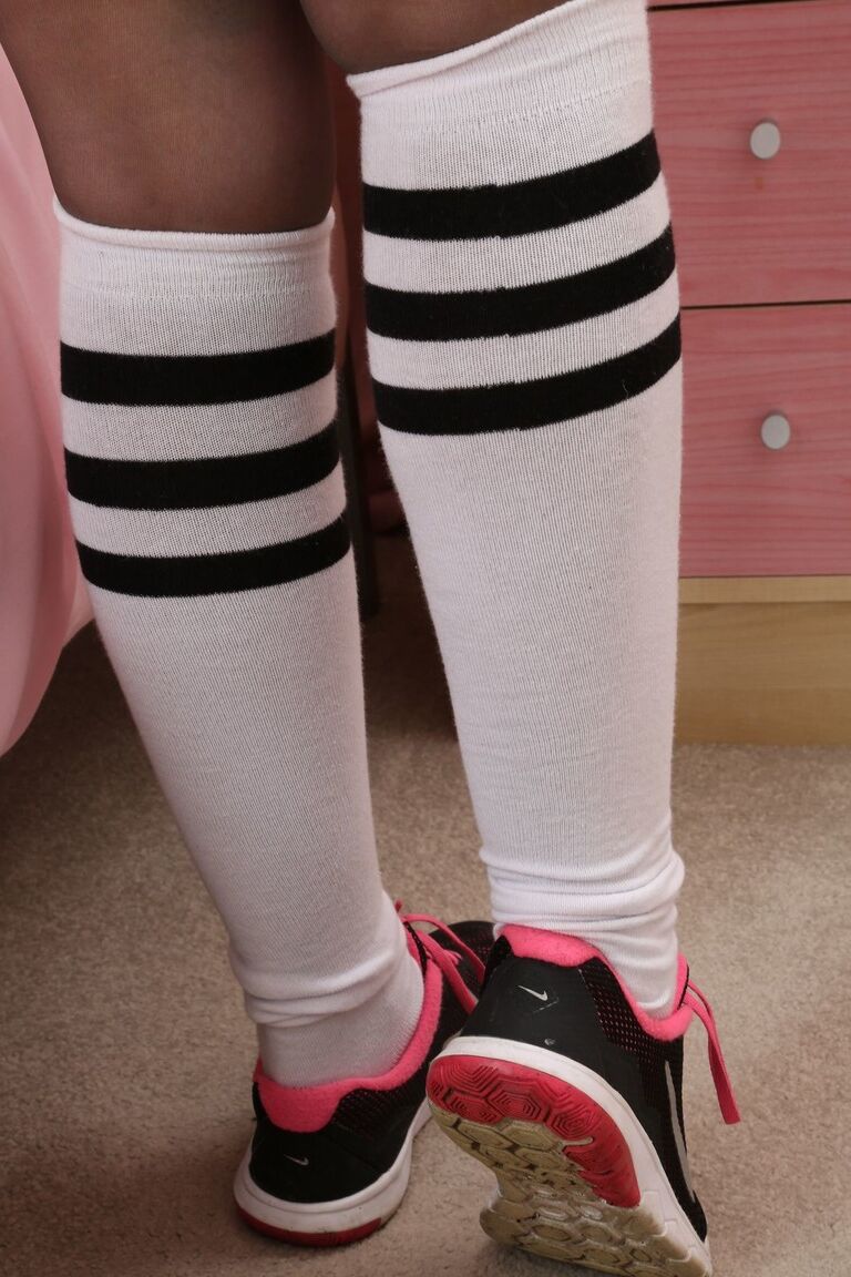 21P Babe with ponytail Emma Rachael strips to pantyhose and flaunts giant tits